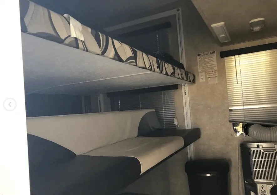 before toyhauler queen bed down